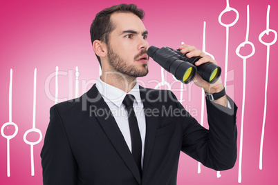 Composite image of surprised businessman standing and holding bi