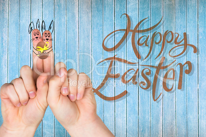 Composite image of fingers as easter bunny