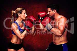 Composite image of boxing couple