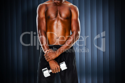 Composite image of mid section of fit shirtless man holding dumb