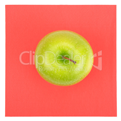 Green apple and red napkin