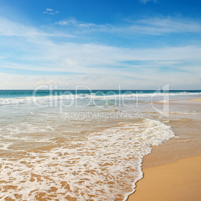 Ocean waves and blue sky