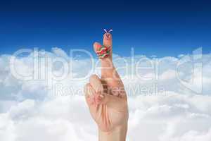 Composite image of fingers as easter bunny