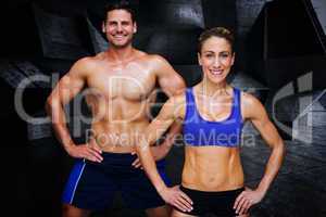 Composite image of bodybuilding couple