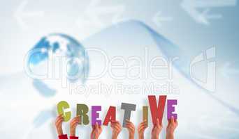 Composite image of hands showing creative