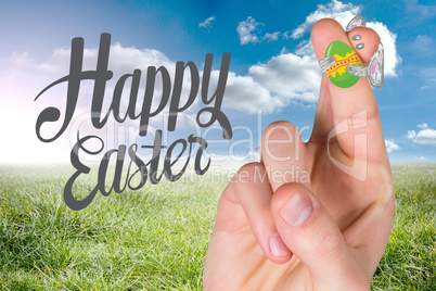 Composite image of fingers as easter bunny