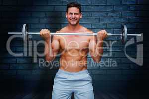 Composite image of handsome bodybuilder