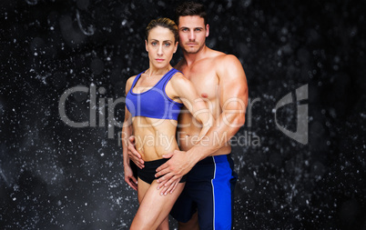 Composite image of bodybuilding couple