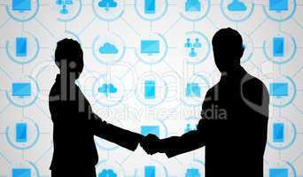 Composite image of smiling business people shaking hands while l