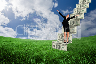 Composite image of excited businesswoman cheering
