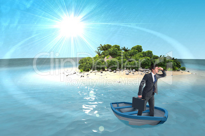 Composite image of businessman in boat