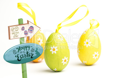 Composite image of easter egg hunt sign