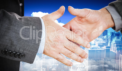 Composite image of two people going to shake their hands Composite image of two people going to shake their hands