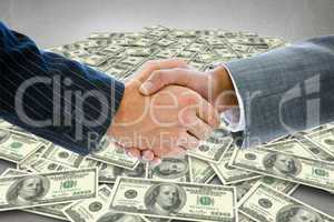 Composite image of business people shaking hands