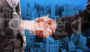 Composite image of close up of two businesspeople shaking their