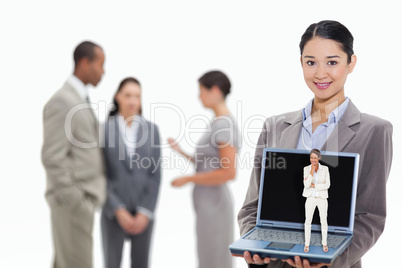 Composite image of thinking businesswoman