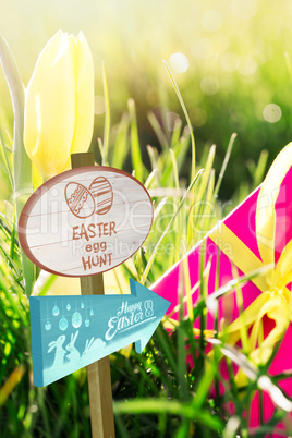 Composite image of easter egg hunt sign