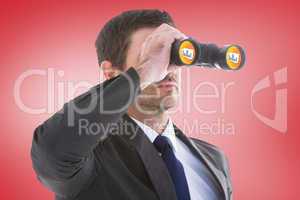 Composite image of young businessman looking through binoculars