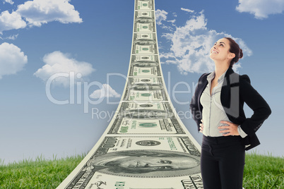 Composite image of happy businesswoman