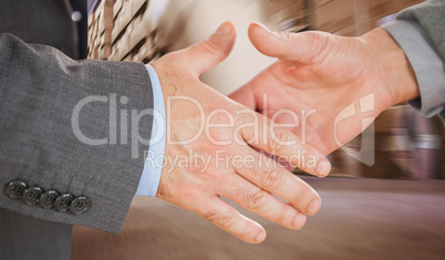 Composite image of two people going to shake their hands