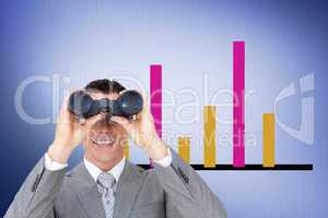 Composite image of businessman holding binoculars