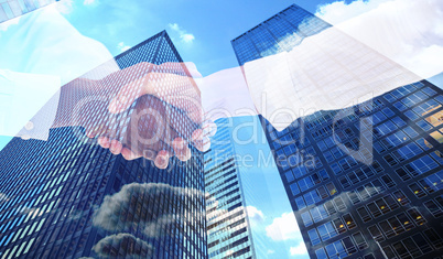 Composite image of close-up shot of a handshake