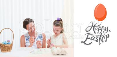 Composite image of mother and daughter painting easter eggs