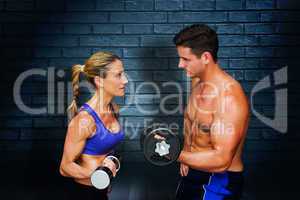 Composite image of bodybuilding couple