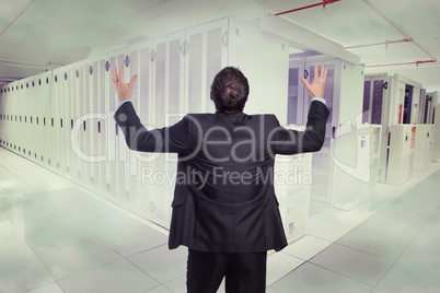 Composite image of gesturing businessman