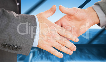 Composite image of two people going to shake their hands