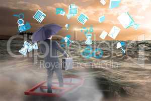 Composite image of businessman in boat with umbrella