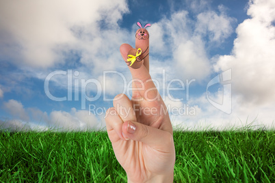 Composite image of fingers as easter bunny