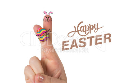 Composite image of fingers as easter bunny