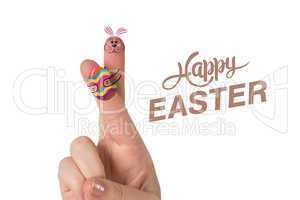 Composite image of fingers as easter bunny