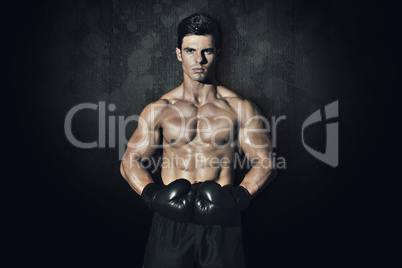 Composite image of muscular boxer