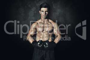 Composite image of muscular boxer