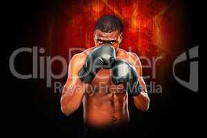 Composite image of muscular boxer