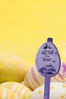 Composite image of easter egg hunt sign