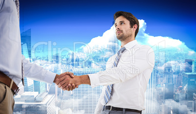 Composite image of two businessmen shaking hands in office