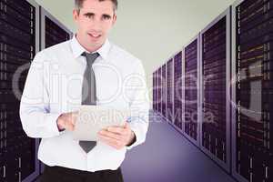Composite image of portrait of a businessman with a tablet compu