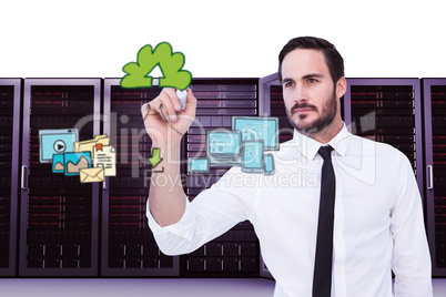 Composite image of focused businessman writing with marker