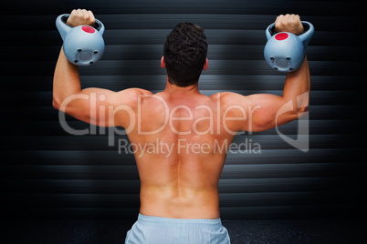 Composite image of bodybuilder holding kettlebell