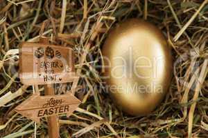 Composite image of easter egg hunt sign