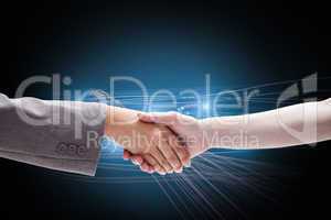 Composite image of handshake between two women