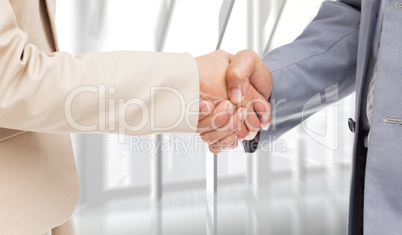 Composite image of close up of people shaking hands