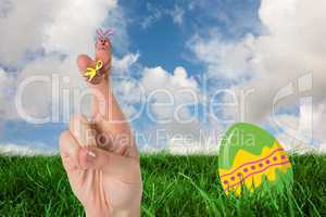 Composite image of fingers as easter bunny