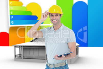 Composite image of architect wearing hard hat while holding clip