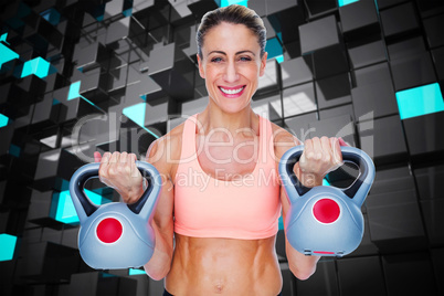 Composite image of smiling female crossfitter lifting kettlebell