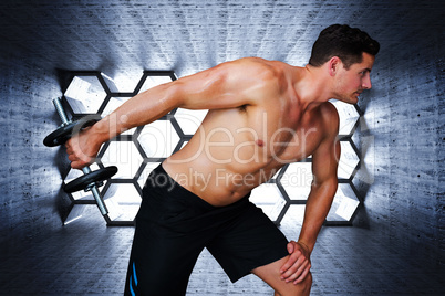 Composite image of bodybuilder lifting dumbbell