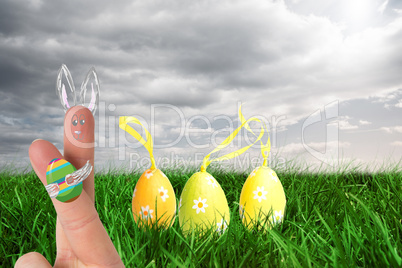 Composite image of fingers as easter bunny